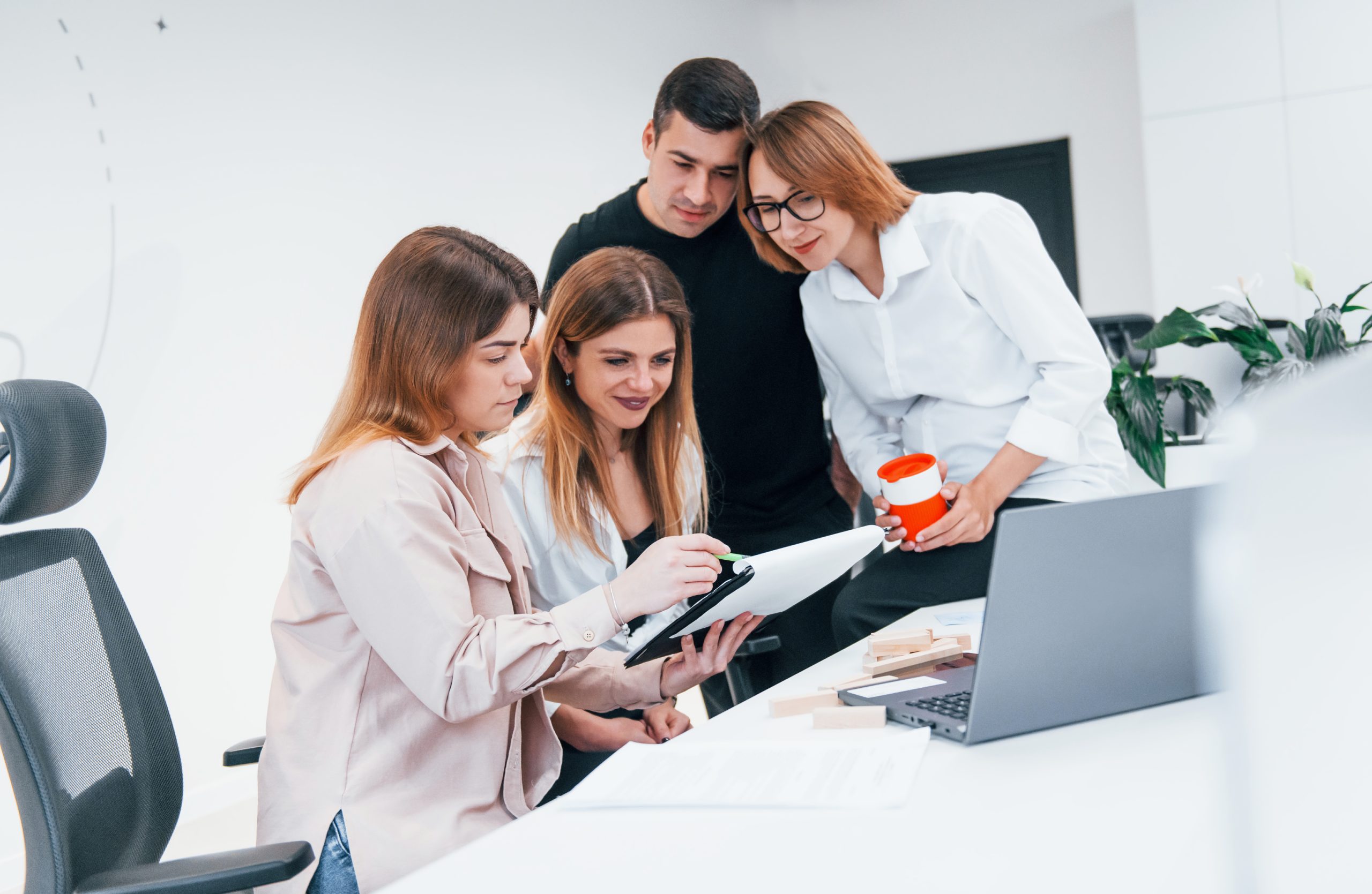 Group of business people in formal clothes indoors in the office